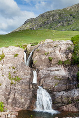 Glencoe Waterfall.  A waterfall in Glencoe in the Scottish highlands.  Glencoe is the most famous of all the Scottish glens.