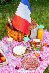 Festive picnic for the national holiday of France 14th of July with French flag