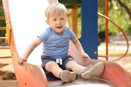 Cute little boy on children's playground