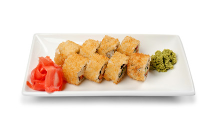 Plate with tasty sushi rolls on white background