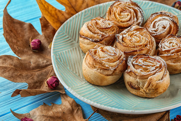 Rose shaped pastry with apple filling on plate