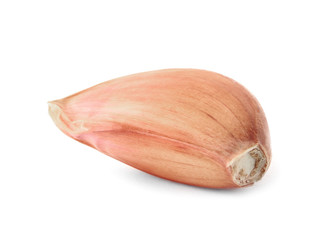 Fresh unpeeled garlic clove on white background