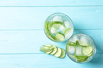 Flat lay composition with natural lemonade on wooden background