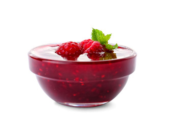Bowl with delicious raspberry jam on white background