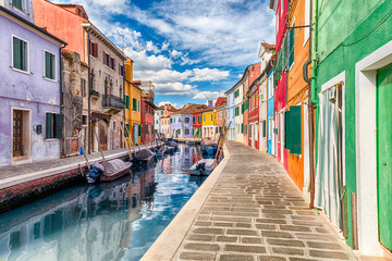 Colorful houses along the canal, island of Burano, Venice, Italy - obrazy, fototapety, plakaty