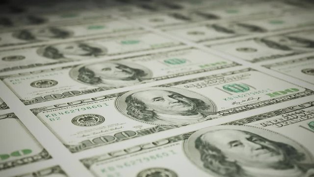 Seamless animation of uncut sheets of old 100 dollars banknotes stacking process