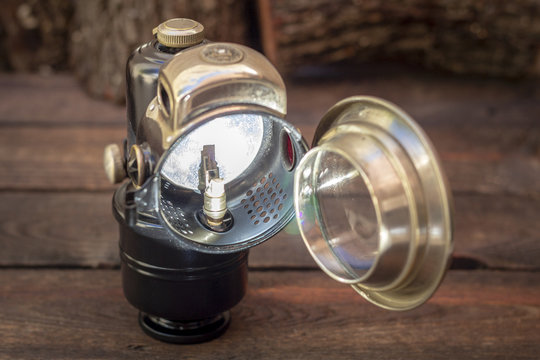 Close up shot of a antique early 1900s carbide cycle lamp, vintage concept.