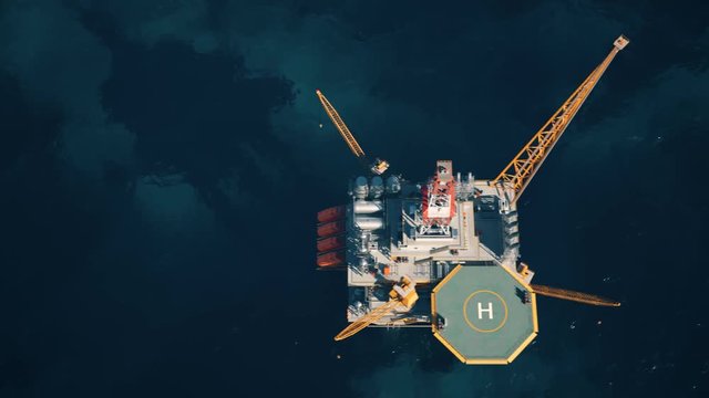 Top view of an offshore oil platform in the open sea. Environmental risk.