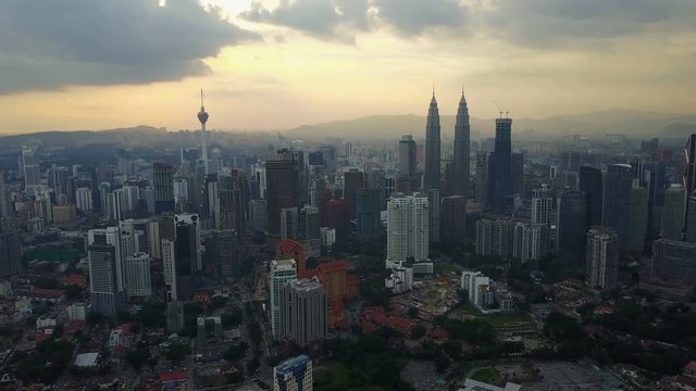 Flying towards the downtown Kuala Lumpur at sunset