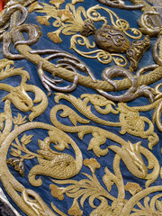 Detail of the embroidered mantle in gold of the Virgin of Tears, Holy Week in Seville, Spain