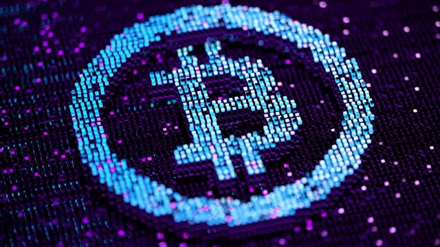 Blue and pink blocks form a bitcoin sign. Digital money, crypto currency, BTC