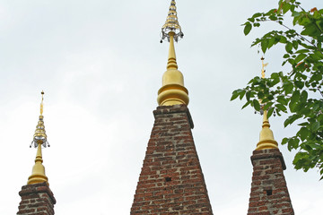 Fototapeta premium Brick with gloden pagoda at Phra Phutthabat Pha Nam temple in Tak ,Thailand