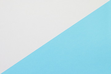 Two color paper with blue and white Overlap on the floor And split half of the image. background