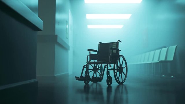 Abandoned wheelchair in empty, foggy hospital waiting corridor. Disability in 4K