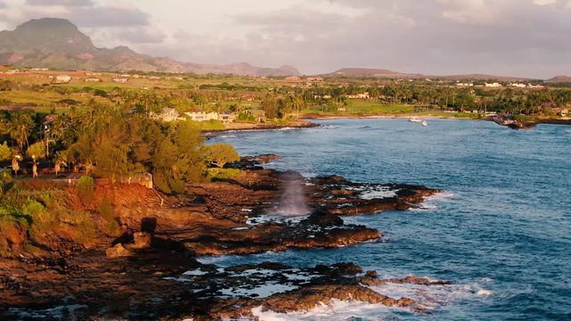 Spouting Horn waterspout  Lawai Road Kauai Hawaii.  Drone video 4k high resolution.  Beautiful Kauai Hawaii photography