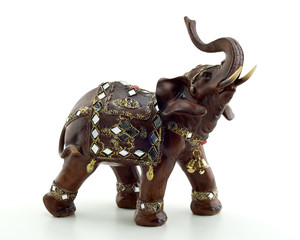 Bronze statuette of elephant isolated on white background