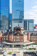 Fototapeta na wymiar Asia Business concept for real estate and corporate construction - panoramic view of modern city skyline and tokyo station under clear sky in tokyo, japan