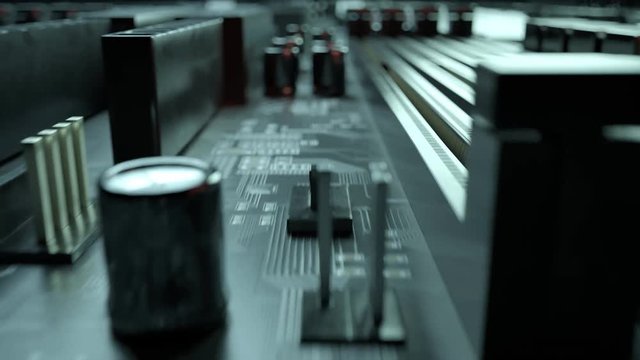 Loopable fly over computer circuit board, transistors, hardware electronics. 4K