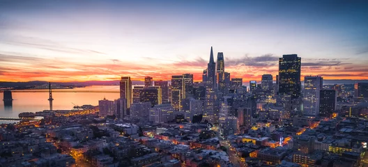 Poster Panorama of the San Francisco skyline with brilliant sunrise © muddymari