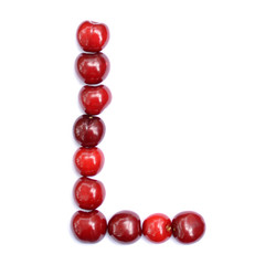 Letter L made with cherries to form a letter of the alphabet. Berry letters on a white background.