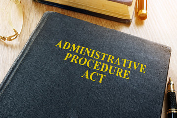 The Administrative Procedure Act (APA) on a desk.