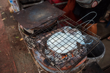 food background white squid grill on stove in kitchen room