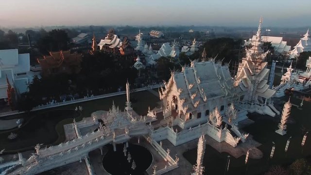 Aerial shot. 3 shots. Around Temple Wat Rog Kuhn (white temple) ,Chiang rai , Thailand in the morning