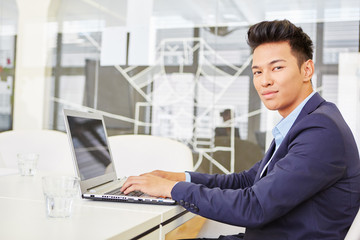 Fototapeta premium Expert programmer with laptop computer
