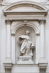 Fototapeta na wymiar Statue of Saint Petrus Urseulus at the Chiesa di San Rocco near the Scuola Grande di San Rocco, Venice