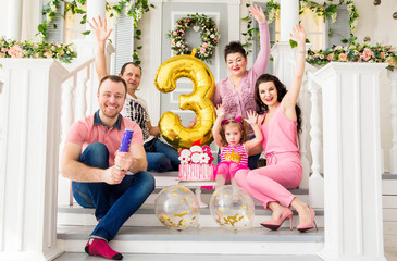 big family celebrates a birthday