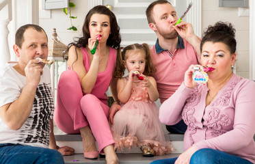 big family celebrates a birthday