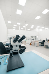 Industrial optical microscope. Workplace for quality control of electronic circuit boards