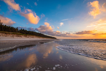 Romantic, colorful sunset over the sea beach, baltic sea, Poland