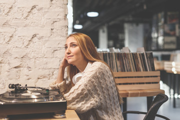 Young girl listening to music