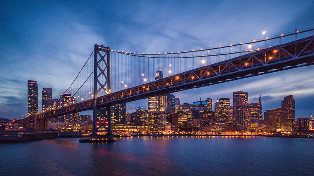 Cityscape view of San Francisco and the Bay Bridge at Night