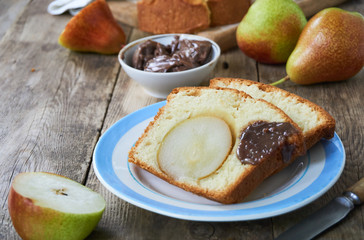 Slices of cake with pears on a plate