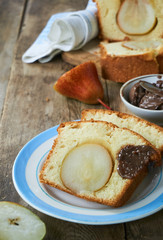 Slices of cake with pears on a plate