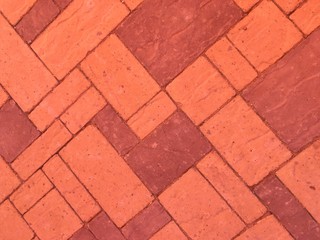 Obraz premium Orange paving stones, tile, brick, geometric shapes abstract texture background.