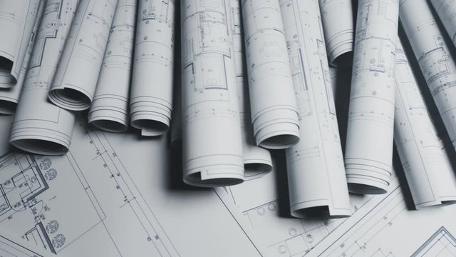 Seamless loopable animation of a stack of white blueprints on the table.