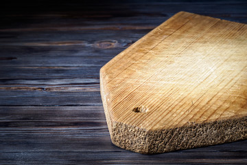 Wooden cutting board on the kitchen vintage table