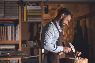 Mature man with a mosaic at work