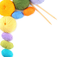 Knitting yarn with needles on white background