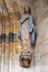madonna figure on ancient church wall © rudolfgeiger