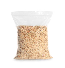 Package with raw oatmeal on white background