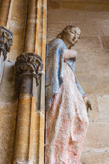 madonna figure on ancient church wall © rudolfgeiger