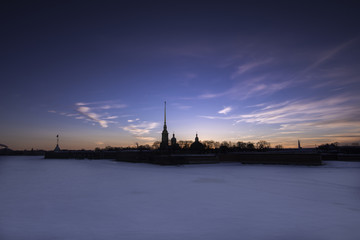View of the Peter and Paul Fortress from the Trinity Bridge during sunset, St. Petersburg, Russia, winter 2018