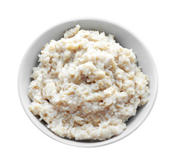 Tasty oatmeal in bowl on white background