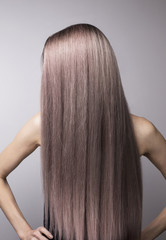 Fototapeta premium Anonymous long straight healthy cold blonde purple hair.