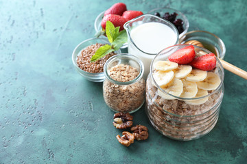 Composition with tasty oatmeal on color textured background