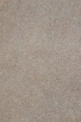 Gray concrete floor texture with small dash pattern. Close-up of scabrous background. Vertical orientation